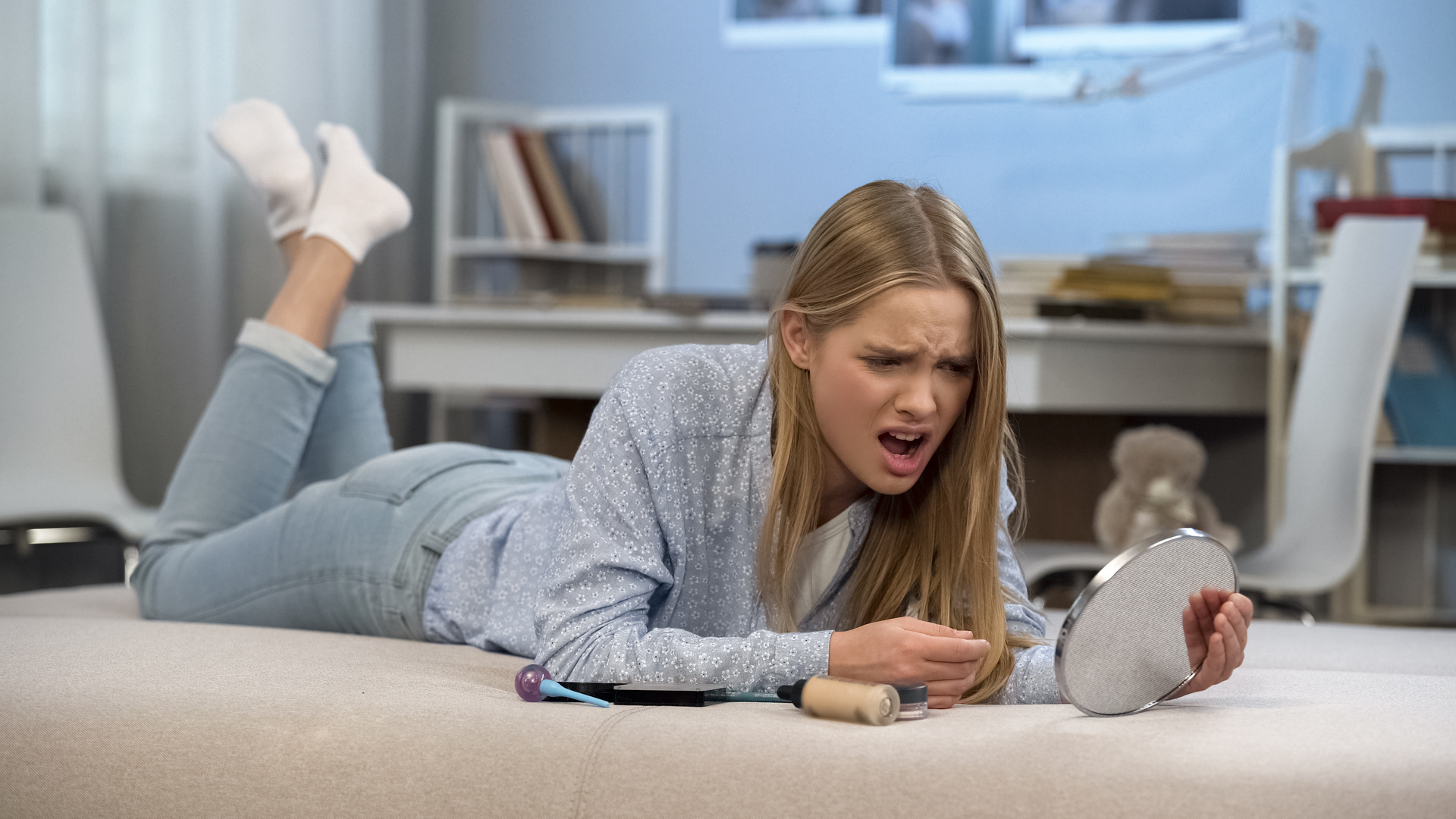 Teenage girl dissatisfied with her appearance, low self esteem, puberty age